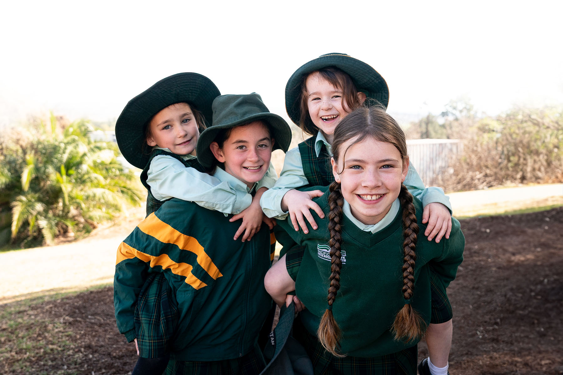 Smiling students playing in the playground